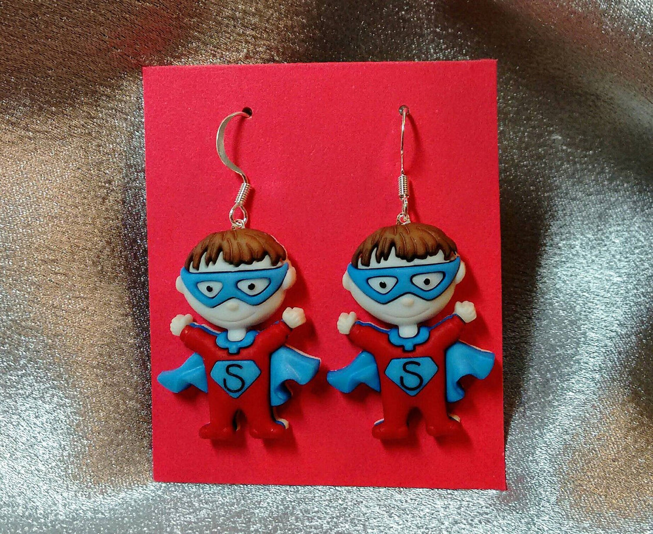 Super hero earrings