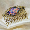 violet, turquoise and copper van gogh stained glass on antiqued gold hair comb handcrafted by brockus creations